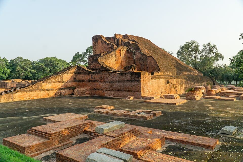 Nalanda: The brick stupa of Temple 3, the Sariputta stupa, among the excavated ruins of Nalanda.